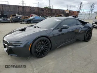 2016 BMW i8 z VIN WBY2Z2C5XGV674797, wystawiony jako Copart lot #44790384 z przebiegiem 58 006 mil mil oraz . Historia ofert i sprzedaży dostępna na DreamBid. Obrazek 1.