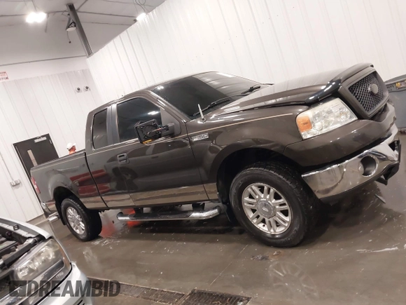 2006 Ford F-150 XLT with VIN 1FTPX14556NA07804, listed as a IAAI auction lot 42177151 with 103,889 mi miles and . Bid and sale history available at DreamBid. Image 13.