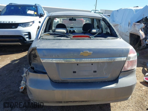 2007 Chevrolet Aveo LS z VIN KL1TD566X7B087387, wystawiony jako IAAI lot #41673057 z przebiegiem 160 577 mil mil oraz . Historia ofert i sprzedaży dostępna na DreamBid. Obrazek 17.