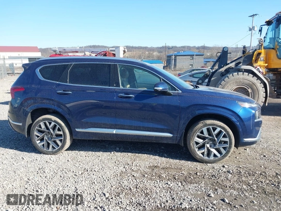 2021 Hyundai Santa Fe Calligraphy z VIN 5NMS5DAL4MH352689, wystawiony jako IAAI lot #41740911 z przebiegiem 15 589 mil mil oraz . Historia ofert i sprzedaży dostępna na DreamBid. Obrazek 13.