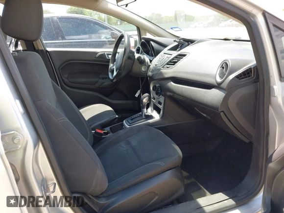 2016 Ford Fiesta SE with VIN 3FADP4BJ4GM101162, listed as a IAAI auction lot 42240414 with 216,099 mi miles and . Bid and sale history available at DreamBid. Image 5.