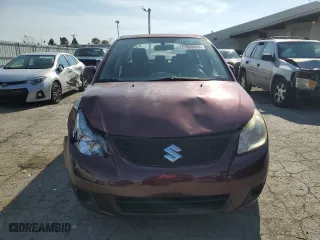 2011 Suzuki SX4 LE with VIN JS2YC5A24B6303358, listed as a Copart auction lot 77808094 with 148,337 mi miles and Clean Title. Bid and sale history available at carsss.com. Image 5.