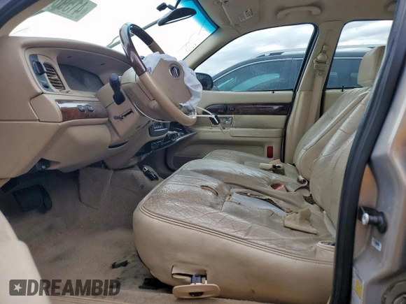 2009 Mercury Grand Marquis LS with VIN 2MEHM75V09X619313, listed as a Copart auction lot 41596455 with 198,017 mi miles and Salvage Title. Bid and sale history available at DreamBid. Image 7.
