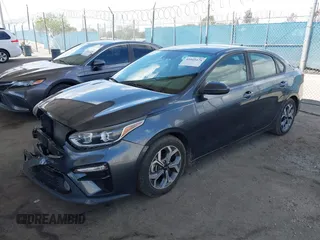 2019 Kia Forte LXS with VIN 3KPF24AD9KE067221, listed as a IAAI auction lot 41945475 with 54,457 mi miles and . Bid and sale history available at carsss.com. Image 2.