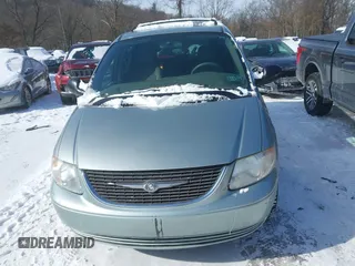 2003 Chrysler Town & Country LX with VIN 2C4GP44L43R224016, listed as a IAAI auction lot 41370108 with 122,418 mi miles and . Bid and sale history available at DreamBid. Image 12.