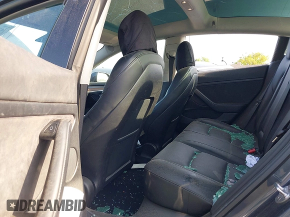 2023 Tesla Model 3 with VIN 5YJ3E1EA4PF427022, listed as a IAAI auction lot 42465964 with 169,346 mi miles and . Bid and sale history available at DreamBid. Image 8.