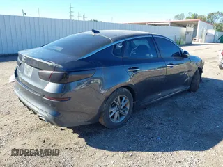 2019 Kia Optima LX with VIN 5XXGT4L3XKG292437, listed as a IAAI auction lot 40682048 with 151,012 mi miles. Bid and sale history available at carsss.com. Image 4.