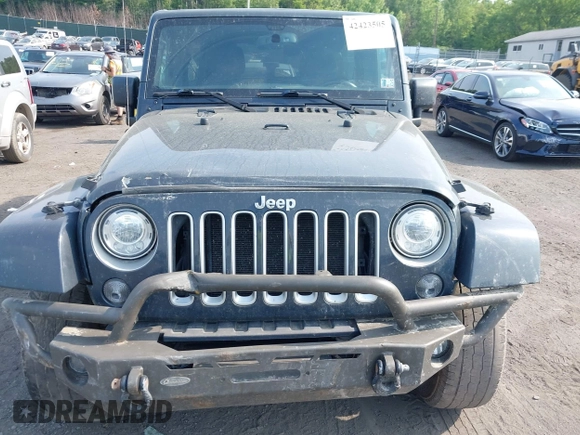 2017 Jeep Wrangler Unlimited Sahara with VIN 1C4BJWEG4HL518945, listed as a IAAI auction lot 42423505 with 155,828 mi miles and . Bid and sale history available at DreamBid. Image 6.