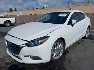 2017 Mazda 3 Touring with VIN 3MZBN1V72HM121902, listed as a IAAI auction lot 39193644 with 40,113 mi miles and . Bid and sale history available at DreamBid. Image 17.