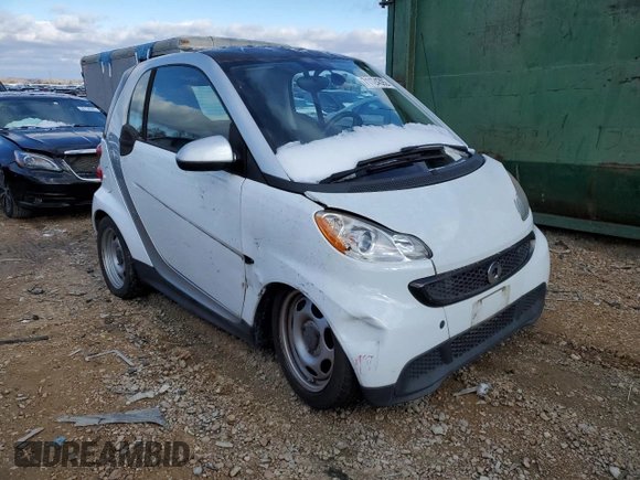 2015 Smart fortwo Passion z VIN WMEEJ3BA8FK790317, wystawiony jako Copart lot #71124392 z przebiegiem Nie podano mil oraz Szkody całkowita. Historia ofert i sprzedaży dostępna na DreamBid. Obrazek 4.