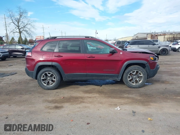2019 Jeep Cherokee Trailhawk Elite with VIN 1C4PJMBX6KD378848, listed as a IAAI auction lot 40754408 with 52,901 mi miles. Bid and sale history available at carsss.com. Image 12.