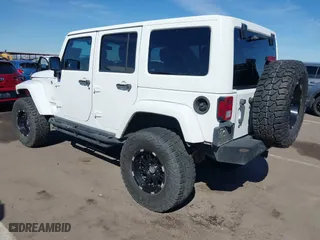 2012 Jeep Wrangler Unlimited Sahara with VIN 1C4BJWEG2CL117080, listed as a IAAI auction lot 41868590 with 92,475 mi miles. Bid and sale history available at carsss.com. Image 3.