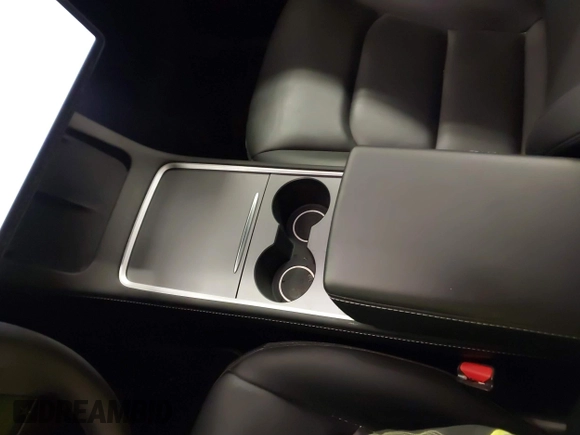 2021 Tesla Model Y Long Range with VIN 5YJYGDEE2MF185945, listed as a IAAI auction lot 41599029 with 53,815 mi miles and . Bid and sale history available at DreamBid. Image 19.