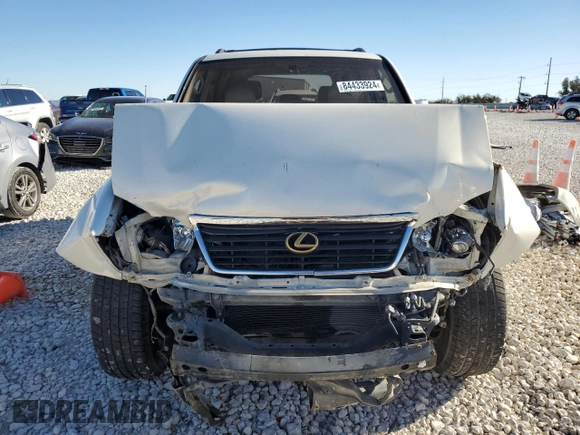2000 Lexus LX 470 z VIN JT6HT00W7Y0114787, wystawiony jako Copart lot #84433924 z przebiegiem Nie podano mil oraz Szkoda całkowita • Salvage title. Historia ofert i sprzedaży dostępna na DreamBid. Obrazek 5.