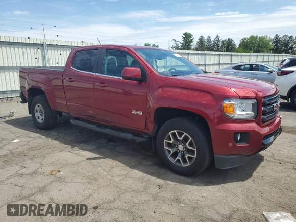 2018 GMC Canyon 4WD All Terrain with VIN 1GTG6CEN8J1281172, listed as a Copart auction lot 61536385 with 93,365 mi miles and Salvage title. Bid and sale history available at DreamBid. Image 4.