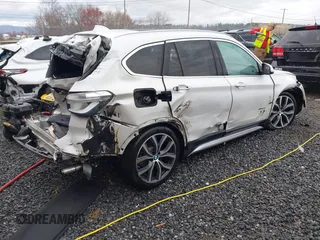 2017 BMW X1 xDrive28i with VIN WBXHT3C36H5F74818, listed as a IAAI auction lot 41853836 with 71,735 mi miles and . Bid and sale history available at DreamBid. Image 4.