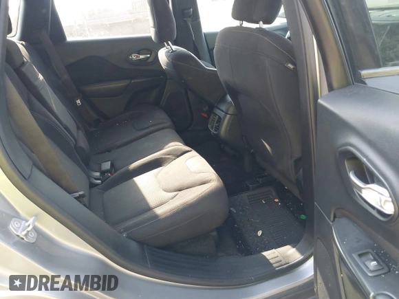 2016 Jeep Cherokee Altitude with VIN 1C4PJMCB0GW108819, listed as a IAAI auction lot 40198342 with 128,949 mi miles and . Bid and sale history available at DreamBid. Image 8.