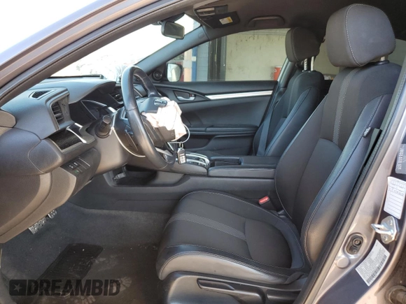 2021 Honda Civic Sport with VIN 19XFC2F80ME003634, listed as a Copart auction lot 52317715 with 69,411 mi miles and Salvage Title. Bid and sale history available at DreamBid. Image 7.