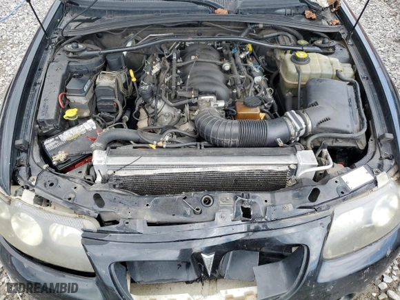 2004 Pontiac GTO with VIN 6G2VX12G94L250415, listed as a Copart auction lot 73210154 with 144,494 mi miles and Salvage Title. Bid and sale history available at carsss.com. Image 11.