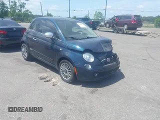 2013 FIAT 500 Lounge with VIN 3C3CFFCR6DT663496, listed as a IAAI auction lot 42030837 with 68,904 mi miles and . Bid and sale history available at DreamBid. Image 1.