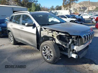 2019 Jeep Cherokee Altitude with VIN 1C4PJMLB4KD113512, listed as a IAAI auction lot 41620815 with 53,182 mi miles. Bid and sale history available at carsss.com. Image 1.