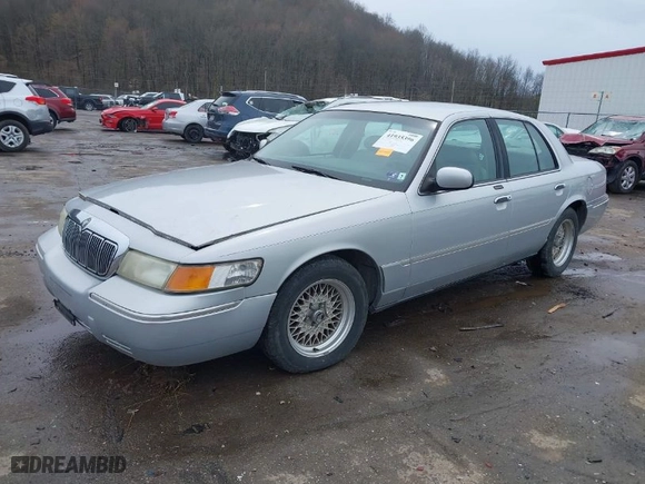 2000 Mercury Grand Marquis LS with VIN 2MEFM75W7YX621719, listed as a IAAI auction lot 41935396 with 167,321 mi miles. Bid and sale history available at carsss.com. Image 2.
