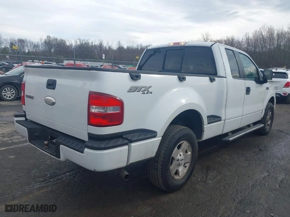 2006 Ford F-150 STX with VIN 1FTRX04W76KB03222, listed as a IAAI auction lot 41970229 with 140,642 mi miles. Bid and sale history available at carsss.com. Image 4.