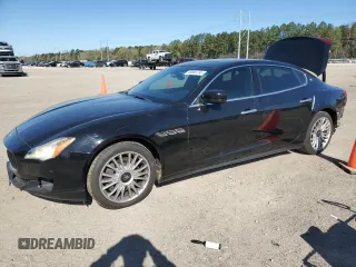 2014 Maserati Quattroporte S Q4 z VIN ZAM56RRA3E1123518, wystawiony jako Copart lot #49866795 z przebiegiem 89 889 mil mil oraz Szkody całkowita. Historia ofert i sprzedaży dostępna na DreamBid. Obrazek 1.