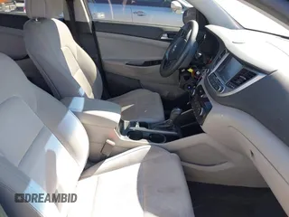 2018 Hyundai Tucson SEL with VIN KM8J3CA42JU618764, listed as a IAAI auction lot 41677046 with 127,980 mi miles. Bid and sale history available at carsss.com. Image 5.