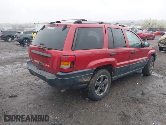 2004 Jeep Grand Cherokee Laredo with VIN 1J4GW48S94C151816, listed as a IAAI auction lot 41983332 with 151,227 mi miles. Bid and sale history available at carsss.com. Image 4.