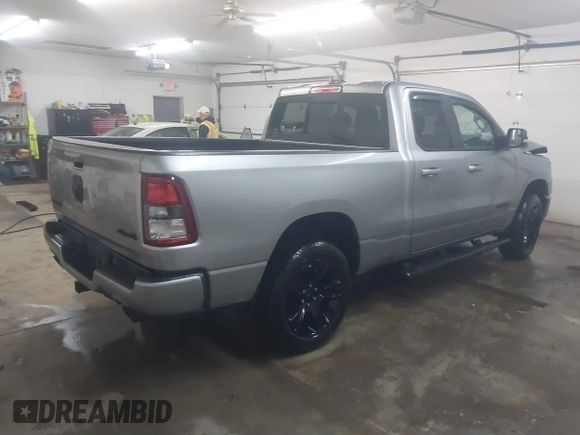 2021 Ram 1500 Big Horn with VIN 1C6SRFBT5MN741351, listed as a IAAI auction lot 41553760 with 56,996 mi miles. Bid and sale history available at carsss.com. Image 4.