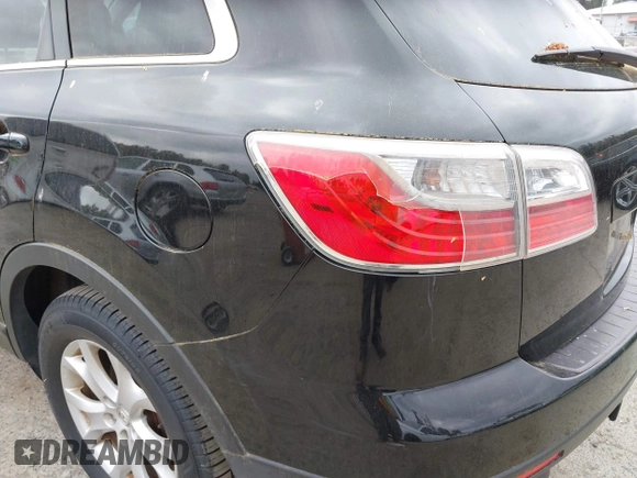 2011 Mazda CX-9 Touring with VIN JM3TB3CV0B0331123, listed as a IAAI auction lot 42260158 with 130,411 mi miles and . Bid and sale history available at DreamBid. Image 6.