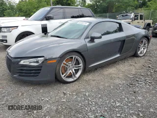 2010 Audi R8 z VIN WUAAUAFGXAN001411, wystawiony jako Copart lot #66520774 z przebiegiem 21 691 mil mil oraz Szkody całkowita. Historia ofert i sprzedaży dostępna na DreamBid. Obrazek 1.
