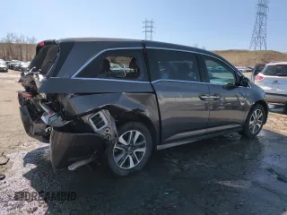 2014 Honda Odyssey Touring with VIN 5FNRL5H95EB052523, listed as a Copart auction lot 52214055 with 131,350 mi miles and Salvage Title. Bid and sale history available at DreamBid. Image 3.