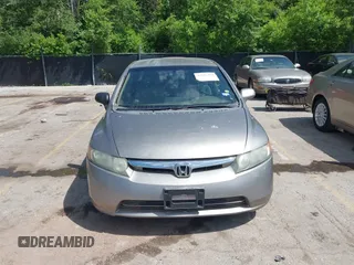 2006 Honda Civic LX z VIN 1HGFA16586L083119, wystawiony jako IAAI lot #42237313 z przebiegiem Nie podano mil oraz . Historia ofert i sprzedaży dostępna na DreamBid. Obrazek 13.