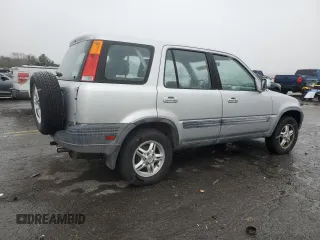 1999 Honda CR-V EX with VIN JHLRD1864XC001402, listed as a Copart auction lot 82047384 with 195,489 mi miles and Clean Title. Bid and sale history available at carsss.com. Image 3.