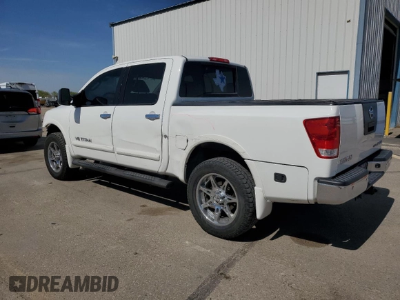 2011 Nissan Titan Pro-4X with VIN 1N6BA0EC2BN317628, listed as a Copart auction lot 52367505 with 178,601 mi miles and Salvage title. Bid and sale history available at DreamBid. Image 2.