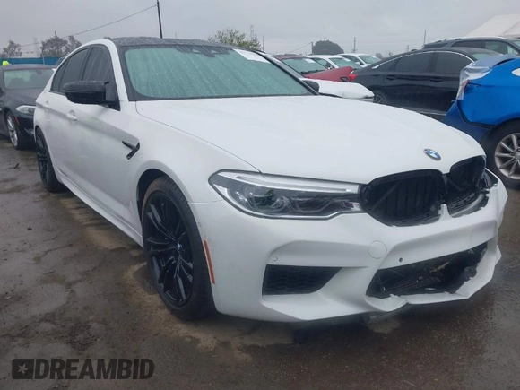 2019 BMW M5 Competition z VIN WBSJF0C52KB447102, wystawiony jako IAAI lot #41778593 z przebiegiem 31 030 mil mil oraz . Historia ofert i sprzedaży dostępna na DreamBid. Obrazek 1.