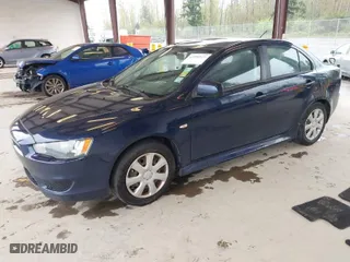 2014 Mitsubishi Lancer ES with VIN JA32U2FU8EU020112, listed as a IAAI auction lot 41990121 with 123,892 mi miles. Bid and sale history available at carsss.com. Image 2.