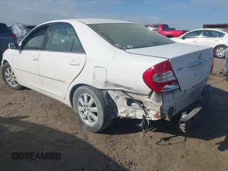 2003 Toyota Camry LE with VIN 4T1BE32K33U249945, listed as a IAAI auction lot 41907000 with 279,723 mi miles and . Bid and sale history available at DreamBid. Image 3.