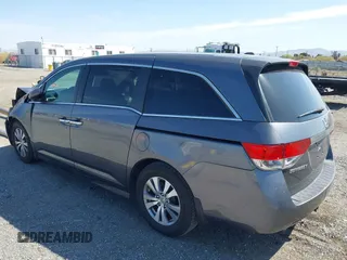 2014 Honda Odyssey EX-L with VIN 5FNRL5H67EB096027, listed as a IAAI auction lot 41950398 with 147,158 mi miles and . Bid and sale history available at DreamBid. Image 3.