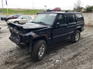 2001 Jeep Cherokee Sport with VIN 1J4FF48S31L615450, listed as a Copart auction lot 55835585 with 246,694 mi miles and Salvage title. Bid and sale history available at DreamBid. Image 1.