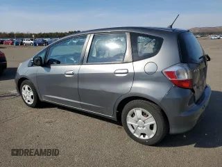 2013 Honda Fit с VIN JHMGE8H34DC080256, выставлен на аукционе Copart как лот 45559375 с пробегом 126 582 миль миль и Списание • Salvage title. История ставок и продаж доступна на DreamBid. Изображение 2.