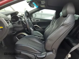 2016 Hyundai Veloster z VIN KMHTC6AD4GU294400, wystawiony jako Copart lot #52755575 z przebiegiem 108 419 mil mil oraz Szkoda całkowita • Salvage title. Historia ofert i sprzedaży dostępna na DreamBid. Obrazek 7.