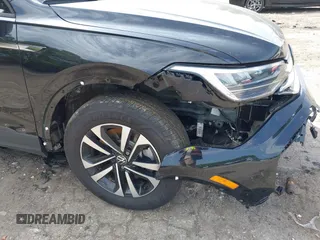 2023 Volkswagen Tiguan S with VIN 3VVRB7AX6PM108735, listed as a IAAI auction lot 42108217 with 13,279 mi miles and . Bid and sale history available at DreamBid. Image 18.