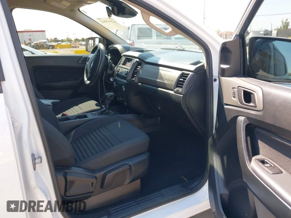 2021 Ford Ranger XL z VIN 1FTER4EH5MLE05003, wystawiony jako IAAI lot #42649042 z przebiegiem 62 571 mil mil oraz . Historia ofert i sprzedaży dostępna na DreamBid. Obrazek 5.