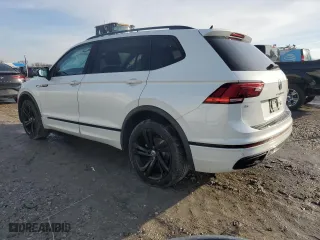 2023 Volkswagen Tiguan SE R-Line Black with VIN 3VVCB7AX8PM121086, listed as a Copart auction lot 45601555 with 27,571 mi miles and Salvage Title. Bid and sale history available at carsss.com. Image 2.