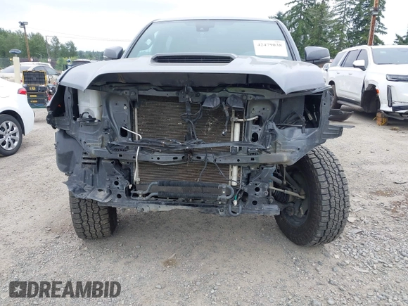2021 Toyota Tacoma SR5 with VIN 3TMDZ5BN1MM119711, listed as a IAAI auction lot 42479038 with 64,779 mi miles and . Bid and sale history available at DreamBid. Image 6.
