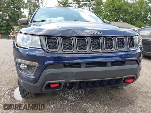 2021 Jeep Compass Trailhawk with VIN 3C4NJDDB0MT590442, listed as a IAAI auction lot 42543530 with 66,669 mi miles and . Bid and sale history available at DreamBid. Image 6.