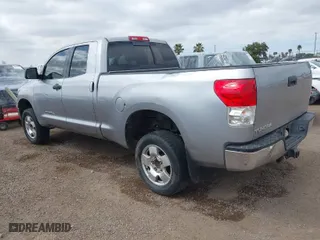 2010 Toyota Tundra 2WD Truck with VIN 5TFRM5F12AX011275, listed as a IAAI auction lot 41871927 with 252,014 mi miles. Bid and sale history available at carsss.com. Image 3.